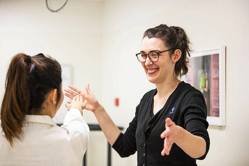 staff interacting with hand gestures 