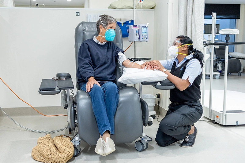 nurse interacting with a patient 
