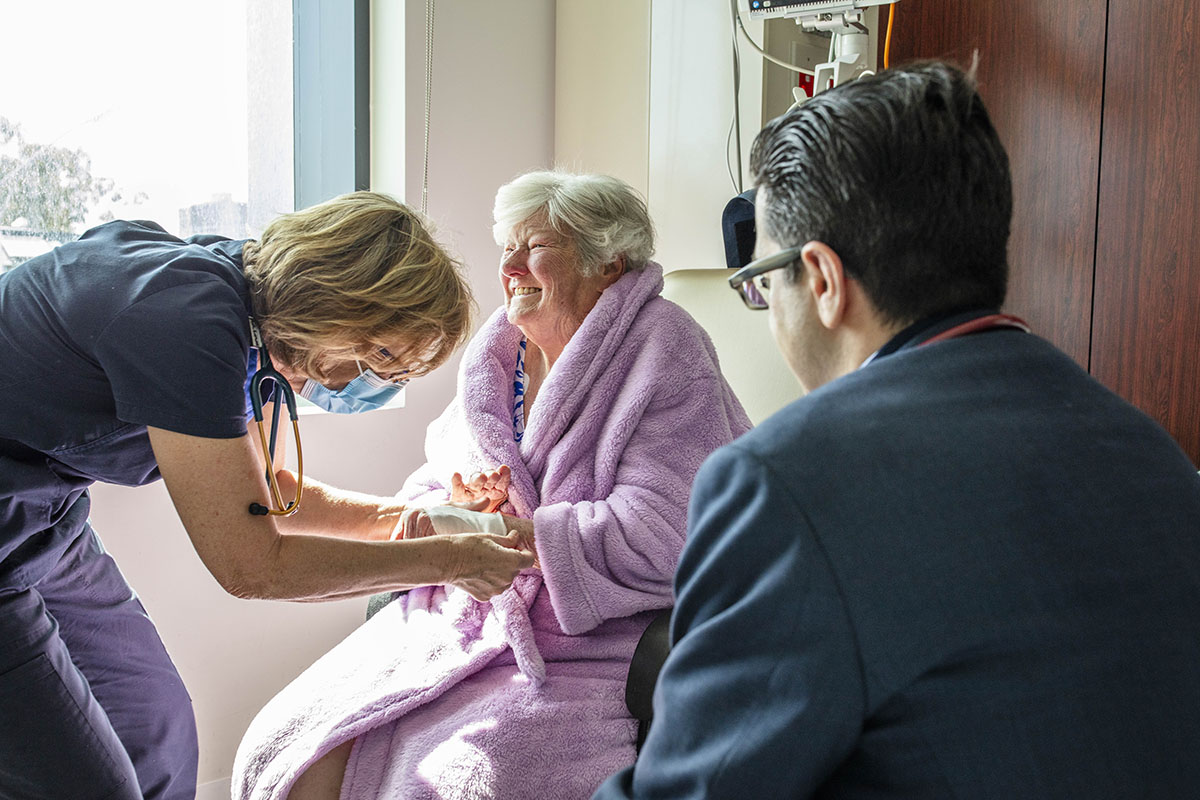 nurse helping patient